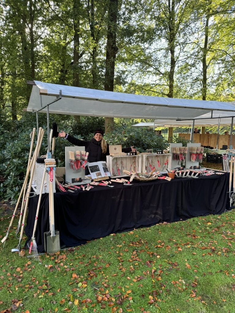 Sneeboer Dutch garden tools displayed at artisan plant market Wiersse
